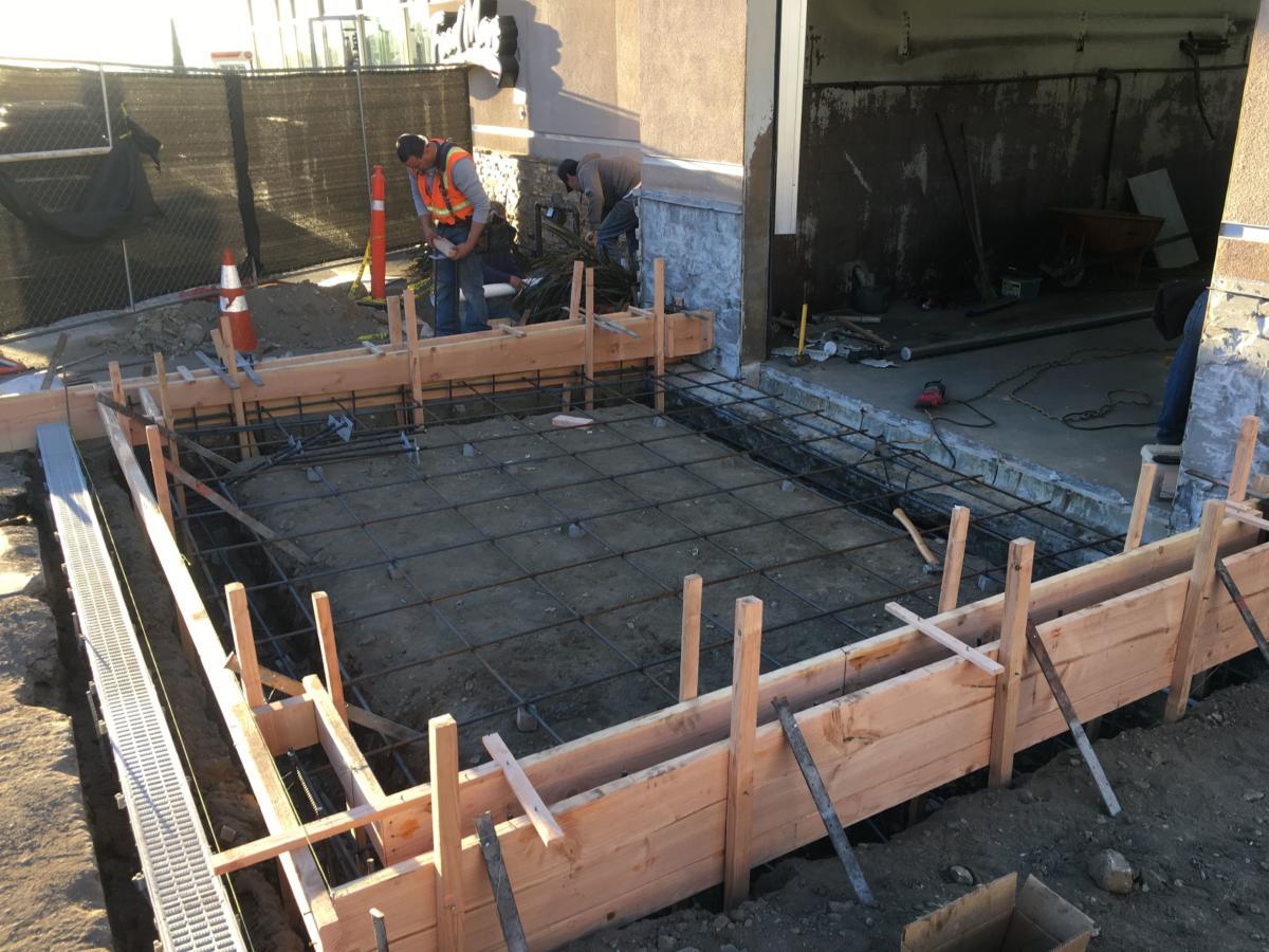 Formed and reinforced concrete footing ready for inspection before pour